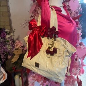 Dooney & Bourke Cream Shoulder Bag with Red Details